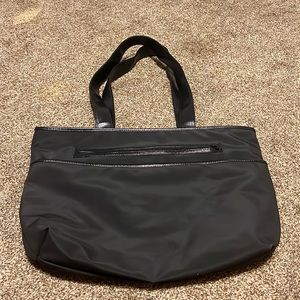 Black tote bag. Immaculate!  Lots of pockets. Waterproof inside.